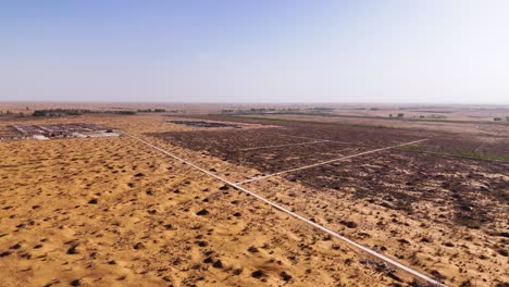 Aerial-establishing-shot-of-the-vast-sand-dunes-at-Tengger-Desert,-China