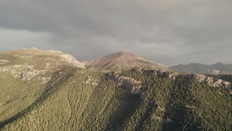 Aerial-view-captures-Zaamin-National-Park's-majestic-mountains-and-lush-greenery