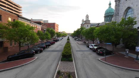 Aerial-FPV-drone-shot-of-State-Street-in-Harrisburg,-Pennsylvania-during-spring-sunset