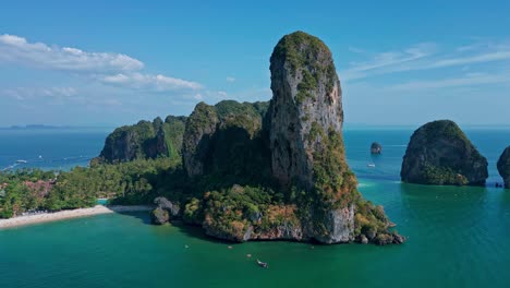 Railay-Beach-With-Huge-Limestone-Rocks-In-Thailand---Aerial-Drone-Shot