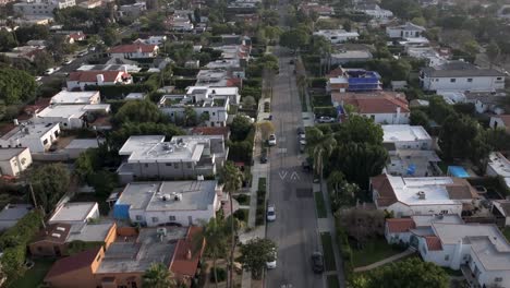 Fairfax-District-is-a-neighborhood-in-Central-Los-Angeles,-California---tilt-down-aerial-flyover