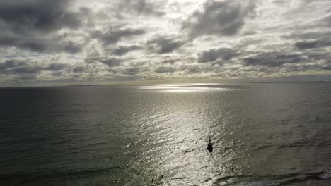 Aerial-Cottesloe-Beach-and-Bell-on-overcast-day,-Perth,-Western-Australia