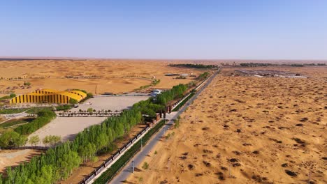 Aerial-shot-of-the-Inner-Mongolia-Autonomous-Region-with-Tengger-Desert-in-the-background,-China