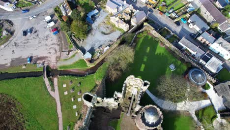 Aerial-top-down-view-of-Laugharne-Castle-and-Coran-River-in-Wales