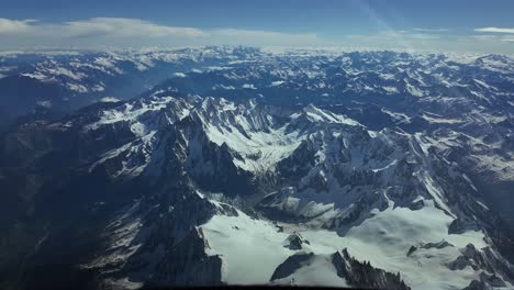 Aerial-POV-of-the-Mont-Blanc-summit-covered-with-snow-in-a-splendid-June-day