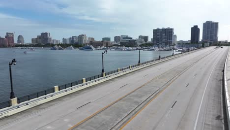 Aerial-flyover-Flagler-Memorial-Bridge-at-West-Palm-Beach,-Florida