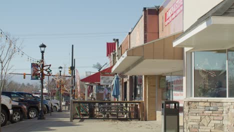 Downtown-Grayling,-Michigan-with-stable-side-view-of-business-district