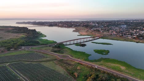 Aerial-view-of-bridge-over-the-Arroyo-Mártires,-Paraná-River-in-the-city-of-Posadas,-Misiones,-Argentina