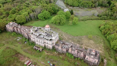 Aerial-view-of-incomplete-and-abandoned-Hamilton-Palace-in-Uckfield,-Sussex,-UK