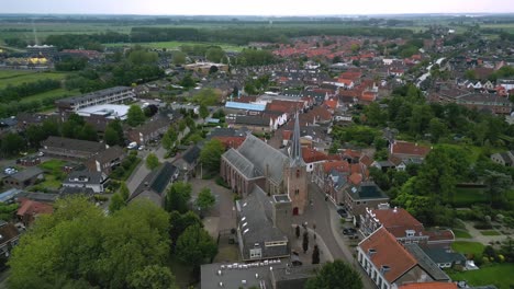 The-historic-village-church-of-Strijen-in-the-Netherlands,-founded-in-the-15th-century,-front-view-and-view-of-both-sides