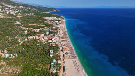 Aerial-overview-of-the-Drymades-Beach-on-the-Albanian-riviera,-in-sunny-Albania