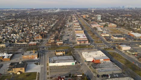 Aerial-Hyperlapse-of-Lincoln-Park-flying-over-Fort-Park-Blvd,-Michigan,-USA