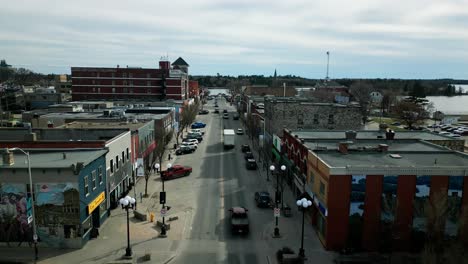 A-Drone-Travels-Down-Main-Street-Small-Rural-Harbor-Fishing-Town-Kenora-Ontario-Canada