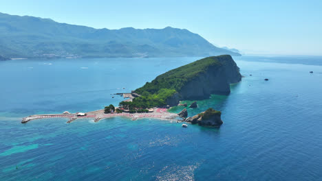 Aerial-view-around-the-Sveti-Nikola-Island,-sunny,-summer-day-in-Montenegro