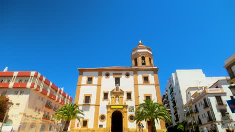 Lady-of-Mercy---Historic-church-with-a-prominent-dome-against-a-bright-blue-sky-in-Ronda,-Spain