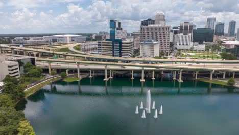 Traffic-and-fountains-in-downtown-Orlando,-Florida