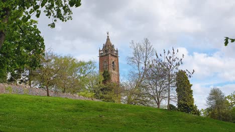 Scenic-outdoor-landscape-view-of-Cabot-Tower-on-Brandon-Hill-in-green-park-and-gardens-with-trees-in-Bristol,-England-UK