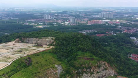 Aerial-views-drone-flyover-Goodview-Heights-residential-areas-capturing-landscape-of-hilly-terrains-and-housing-developments-in-Kajang,-Selangor,-Malaysia,-Southeast-Asia