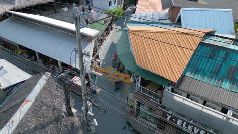 7-eleven-shop-onnarrow-walkingstreet-lined-with-shops-and-homes-koh-Lipe-asia