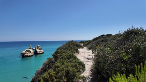 Strolling-Toward-Spiaggia-delle-Due-Sorelle-in-the-Lecce-Region,-Italy