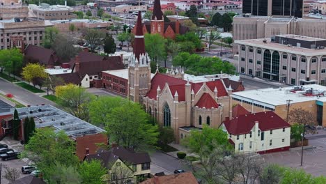 Drone-establishing-angled-view-of-rear-side-of-Cathedral-church-in-Pueblo-Colorado