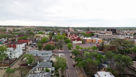 Aerial-dolly-to-Cathedral-in-Pueblo-Colorado-surrounded-by-suburban-neighborhood