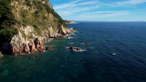 Panoramic-Sea-Scene-of-Rocky-Coastline-with-Tall-Cliffs-Washed-by-Clear-Ionian-Waters,-Popular-with-Outdoor-Tourists