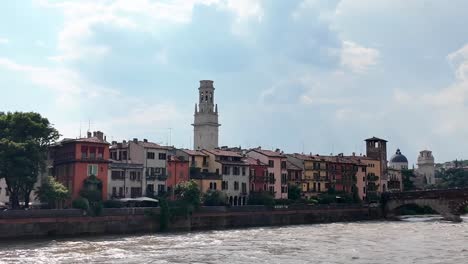 River-Adige-in-Verona,-Italy-and-panorama-of-the-first-row-houses-near-the-bridge-Ponte-Pietra