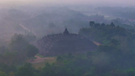 Aerial-scene-of-the-ancient-ruins-of-Borobudur-in-hazy-morning