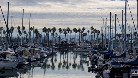 The-boats-dock-with-the-reflection-of-the-trees-on-the-water