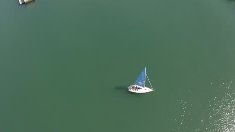 A-sailboat-gracefully-turns-while-sailing-on-the-sea