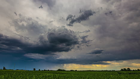 A-captivating-time-lapse-of-storm-clouds-moving-across-a-vast-expanse-of-farmland