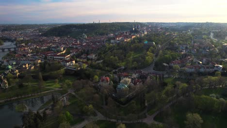 Beautiful-aerial-panoramic-overview-of-Prague-with-bridges-crossing-river,-Czech-Republic