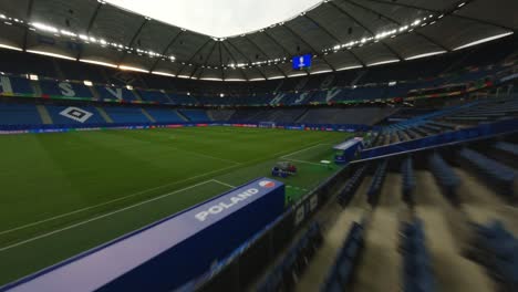 FPV-Drone-HSV-Hamburg-flying-over-stands-towards-goal