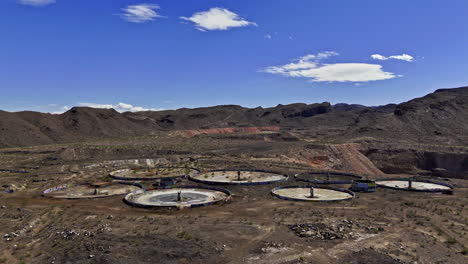 Aerial-view-rising-toward-the-Wheel-of-Misfortune,-in-sunny-Henderson,-NV,-USA