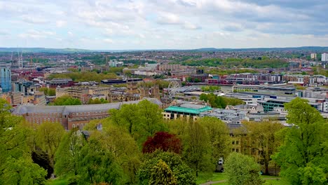 Aerial-view-of-the-city-of-Bristol-with-houses,-offices-and-landmarks-from-Cabot-Tower-on-Brandon-Hill-in-England-UK
