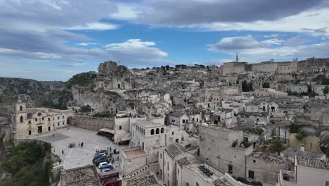 Timelapse-of-the-Ancient-City-of-Matera-with-Clouds-Moving-Around-in-Basilicata-Region,-Italy