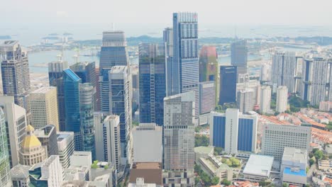 Luftaufnahmen-Von-Wolkenkratzern-In-Singapur-Mit-Der-Skyline-Der-Stadt