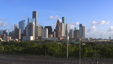 Ascending-drone-shot-reveal-downtown-Houston,-Texas-from-North-East