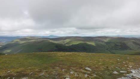 Slow-establishing-shot-of-a-loch-and-hills-from-the-Ben-Chonzie-summit