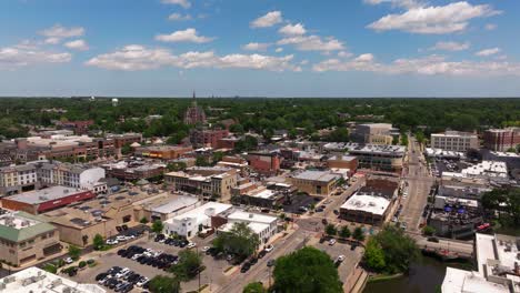 Aerial-Pullback-Reveals-Beautiful-Downtown-Naperville,-Illinois
