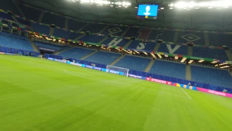 FPV-Drohne-Taucht-Aus-Stockfinsterem-Himmel,-UEFA-Euro-2024,-Hamburg,-HSV-Stadion