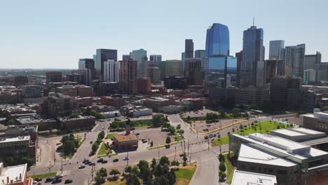 Aerial-View-of-Downtown-Denver,-streets-and-light-morning-traffic