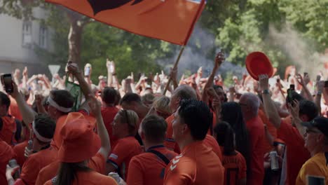 Dutch-football-fans-preparing-for-the-Euro-2024-anthem-links-rechts-from-Snollebollekes