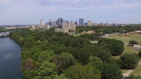 Aerial-View-of-Austin-Skyline,-Texas---camera-is-rising-from-low-angle-to-high-angle