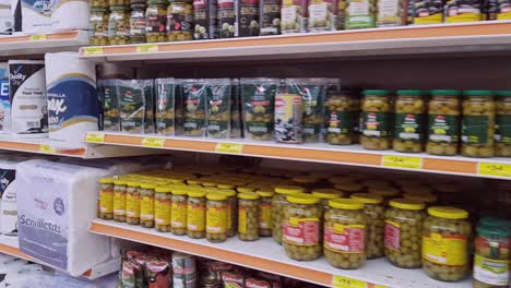 Selecting-Olives-and-toilet-paper-from-their-shelves-on-"Soriana"-supermarket