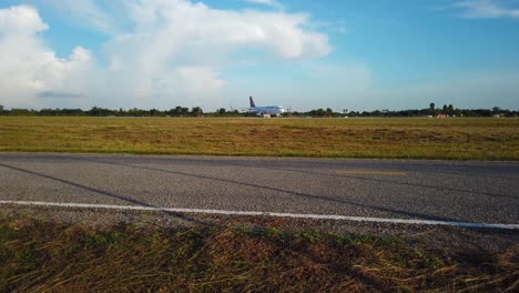 Tracking-shot-of-Cambodia-Angkor-air-landing-on-the-runway-in-siem-reap-international-airport-in-4k