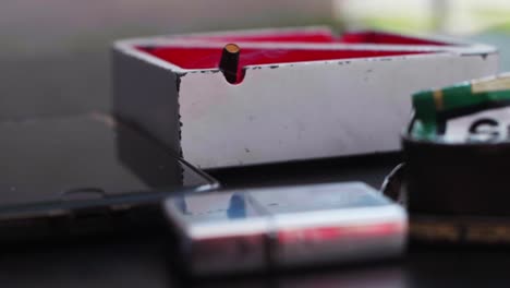 Table-Phone-Lighter-Cigarette-Slow-Motion-Smoke-Tobacco-Ashtray