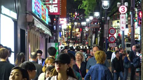 A-view-of-takeshita-street-with-crowd-at-night-timelapse