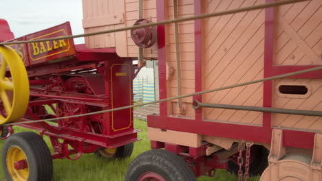 A-working-vintage-steam-powered-hay-baler-in-action